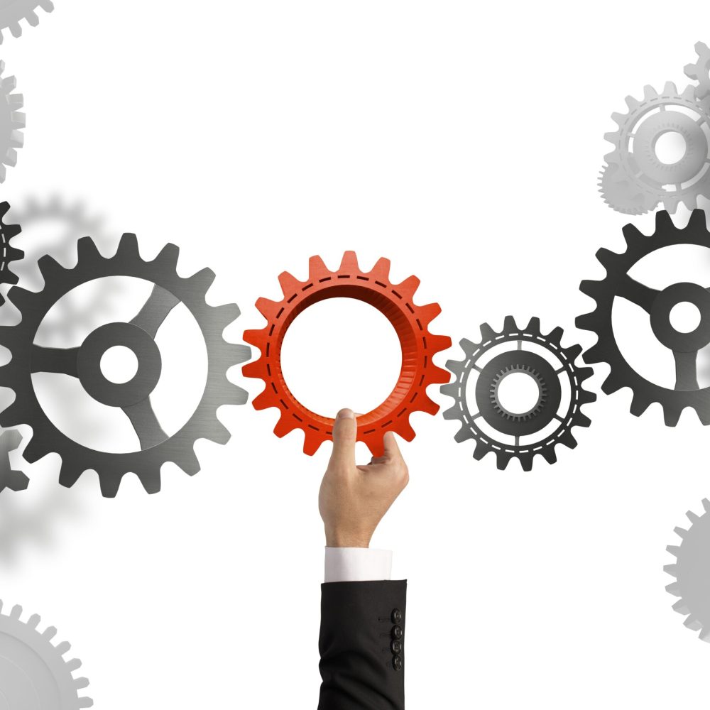 Businessman builds a business system with gear